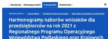Zrzut ekranu strony Województwa Podlaskiego  „Harmonogramy naborów wniosków dla przedsiębiorców na rok 2021 w ramach RPOWP oraz Krajowych Programów Operacyjnych”
